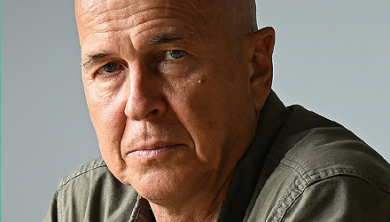 Headshot of Journalist Peter Greste, the speaker for the 2026 Solomon Lecture, part of the OIC's celebrations for IAID 2026